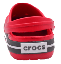 Red Crocs clogs with black and white stripes
